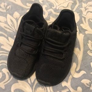 These are black adidas for babies.